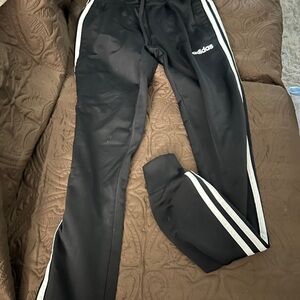 Adidas Black and White Track Pants with Iconic Stripes